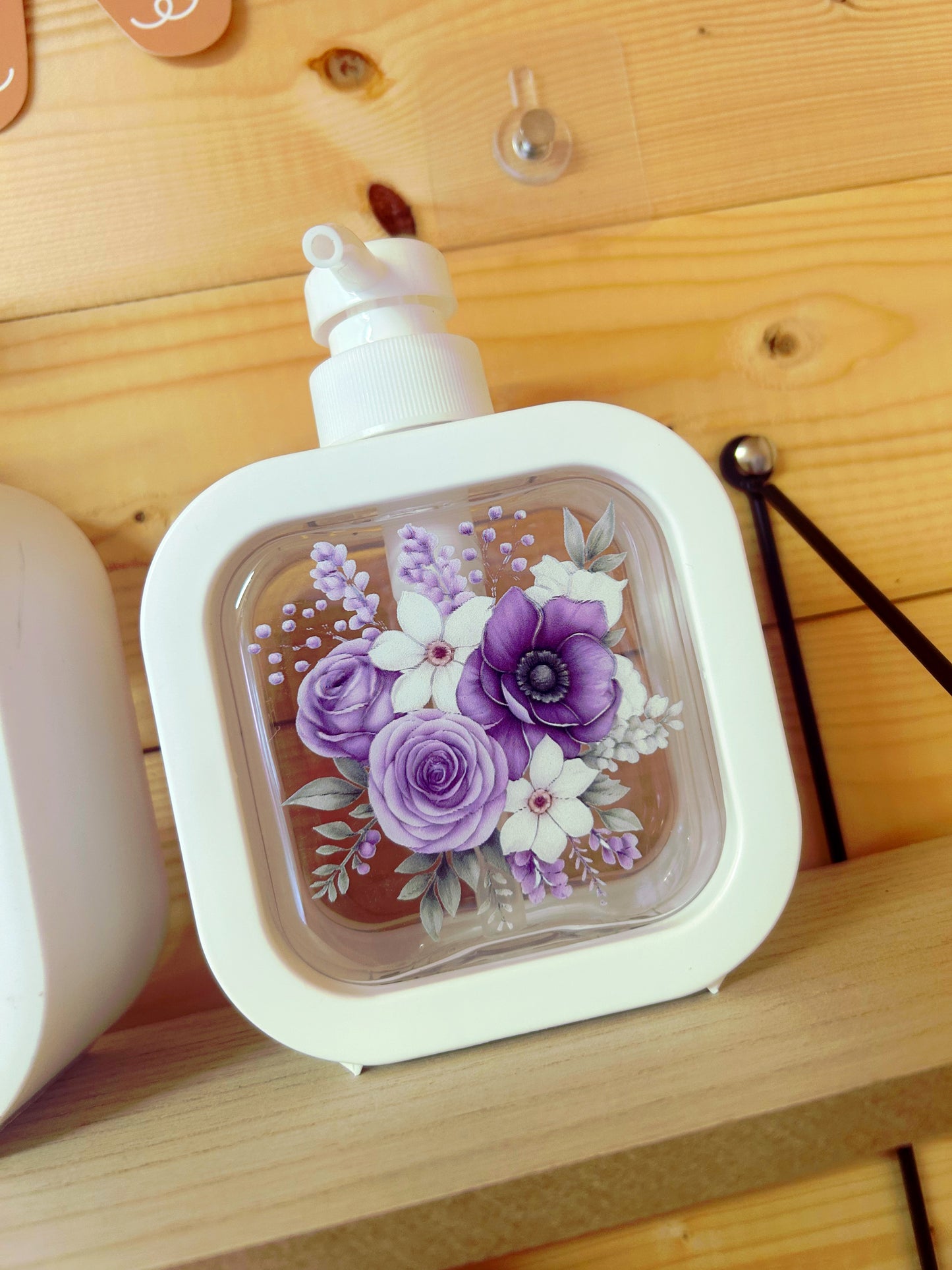 Purple floral soap dispenser