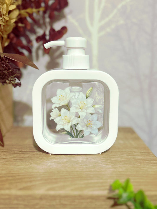 White floral soap dispenser